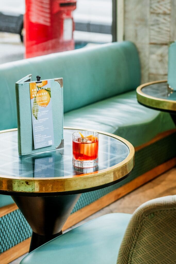 A cocktail on a table in Riva Blu Liverpool